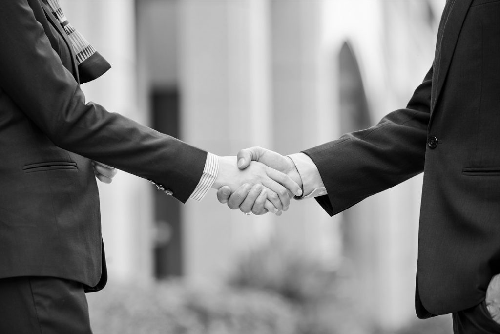 agreement shaking hands